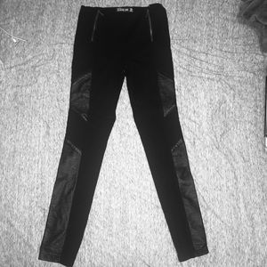 Cute, black pants with snug fit.